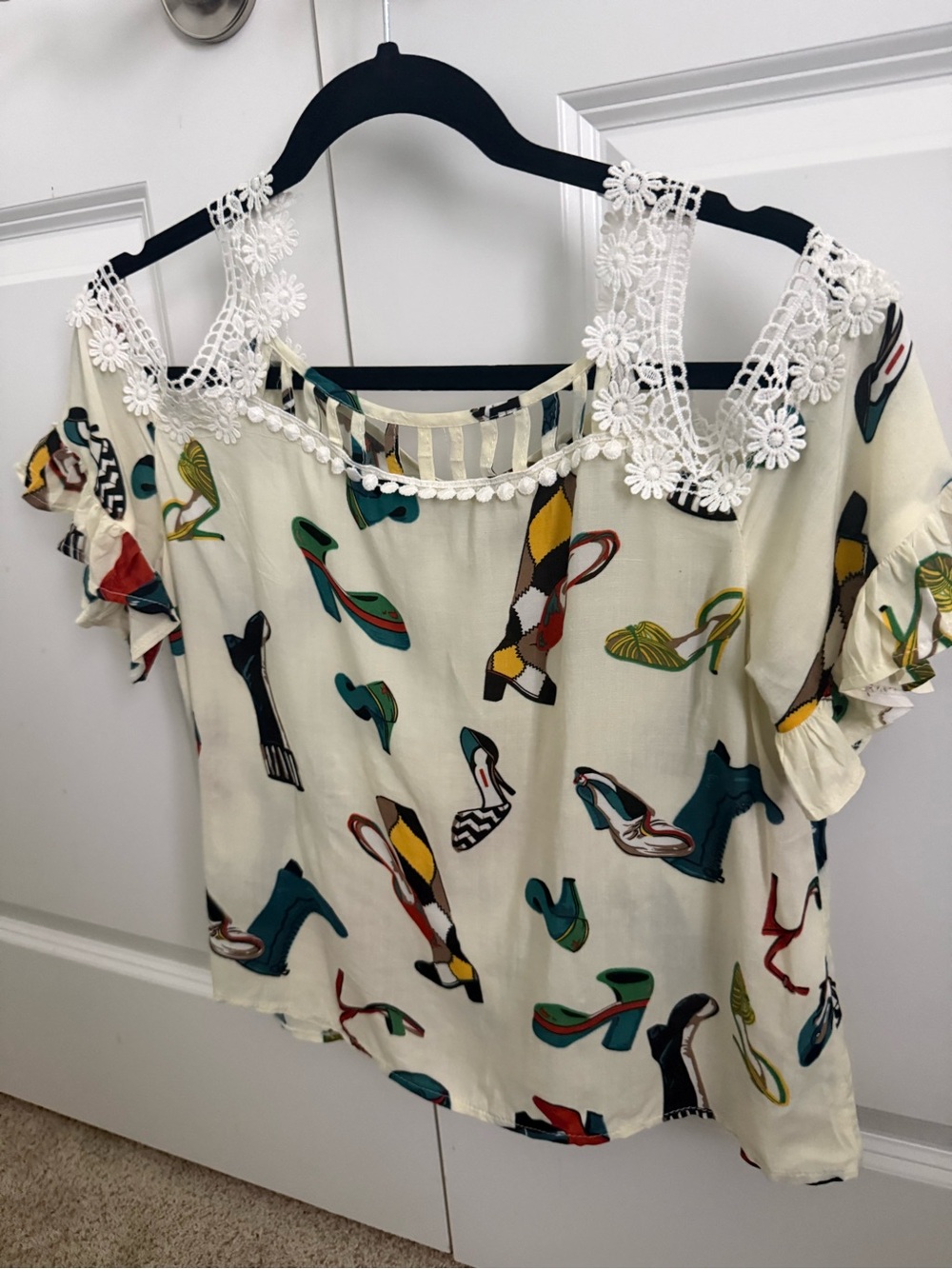 Women’s Cream Short-Sleeve Top with Lace Collar and Cowboy Boot  and Shoe Print